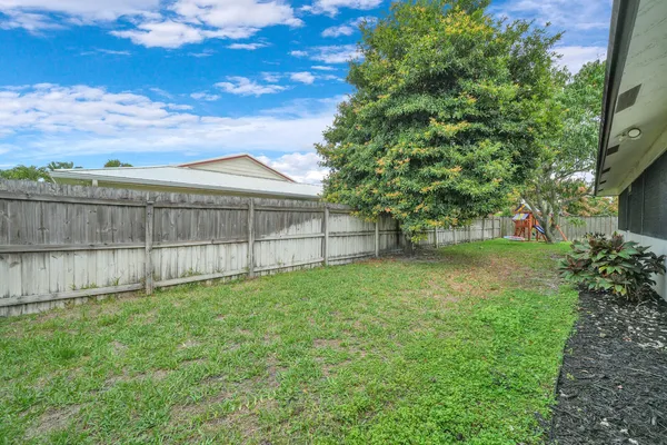 a view of a backyard with a garden