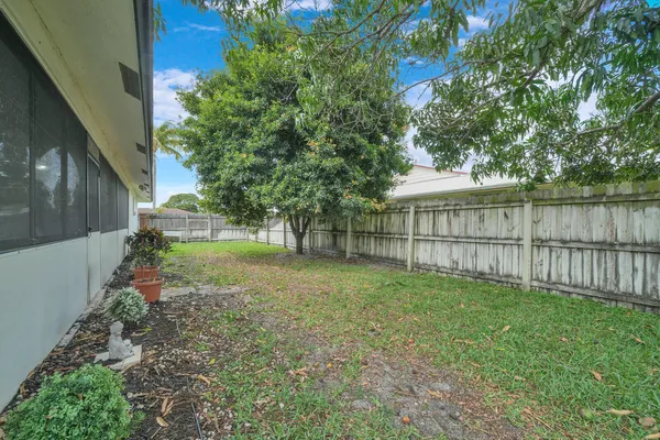 a view of backyard with green space