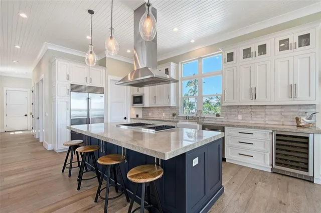 a bedroom with a large bed and a couch