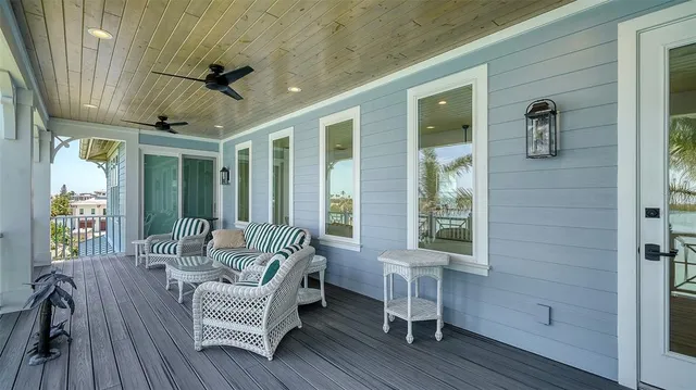 an aerial view of a city with lots of residential buildings lake and ocean view