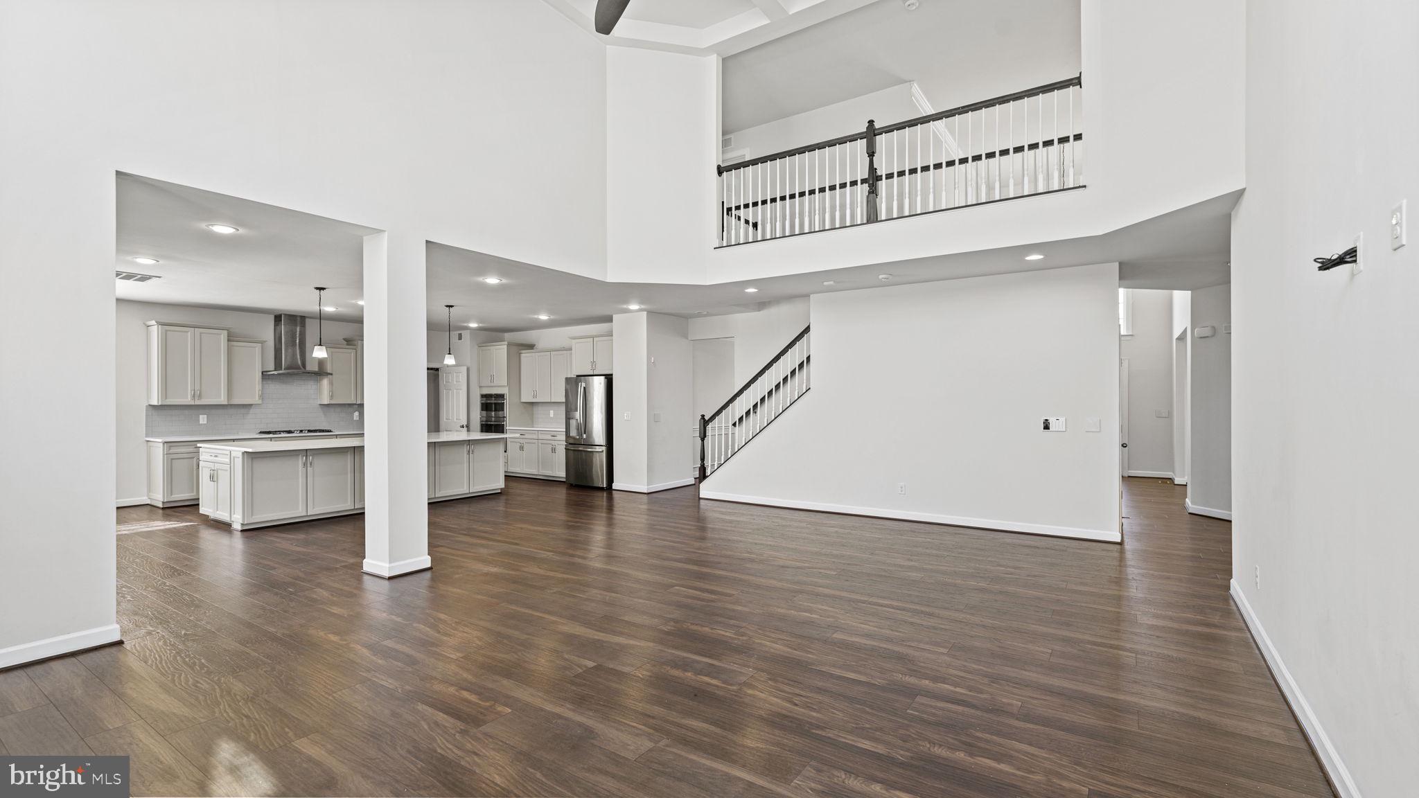 250 Perth Drive Fredericksburg, VA 22405 - Photo 13 of 57 Family room view of stairs and upstairs hall