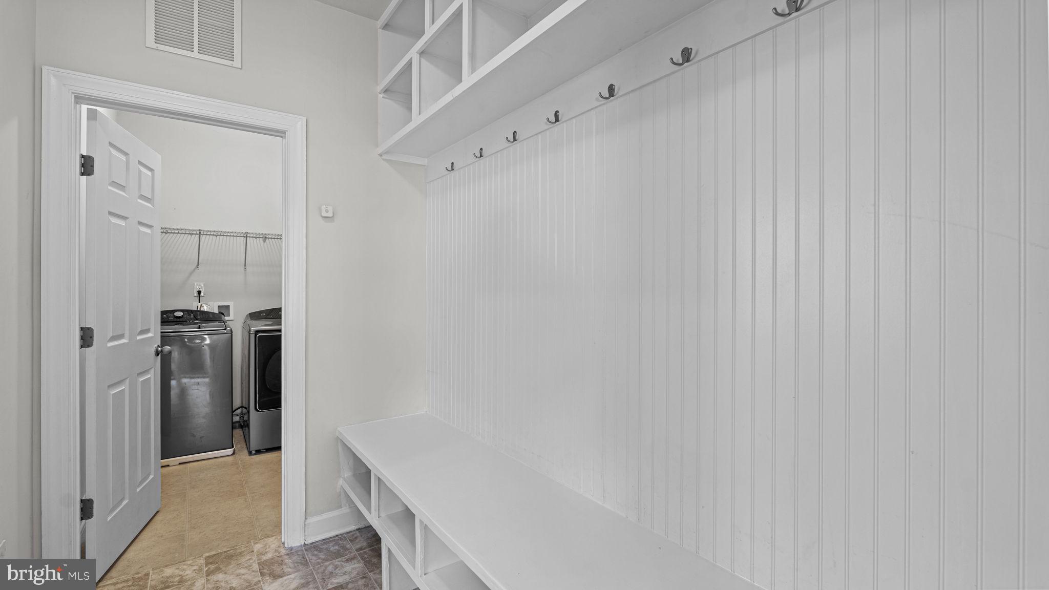 250 Perth Drive Fredericksburg, VA 22405 - Photo 19 of 57 Custom coat and shoe rack off the laundry room