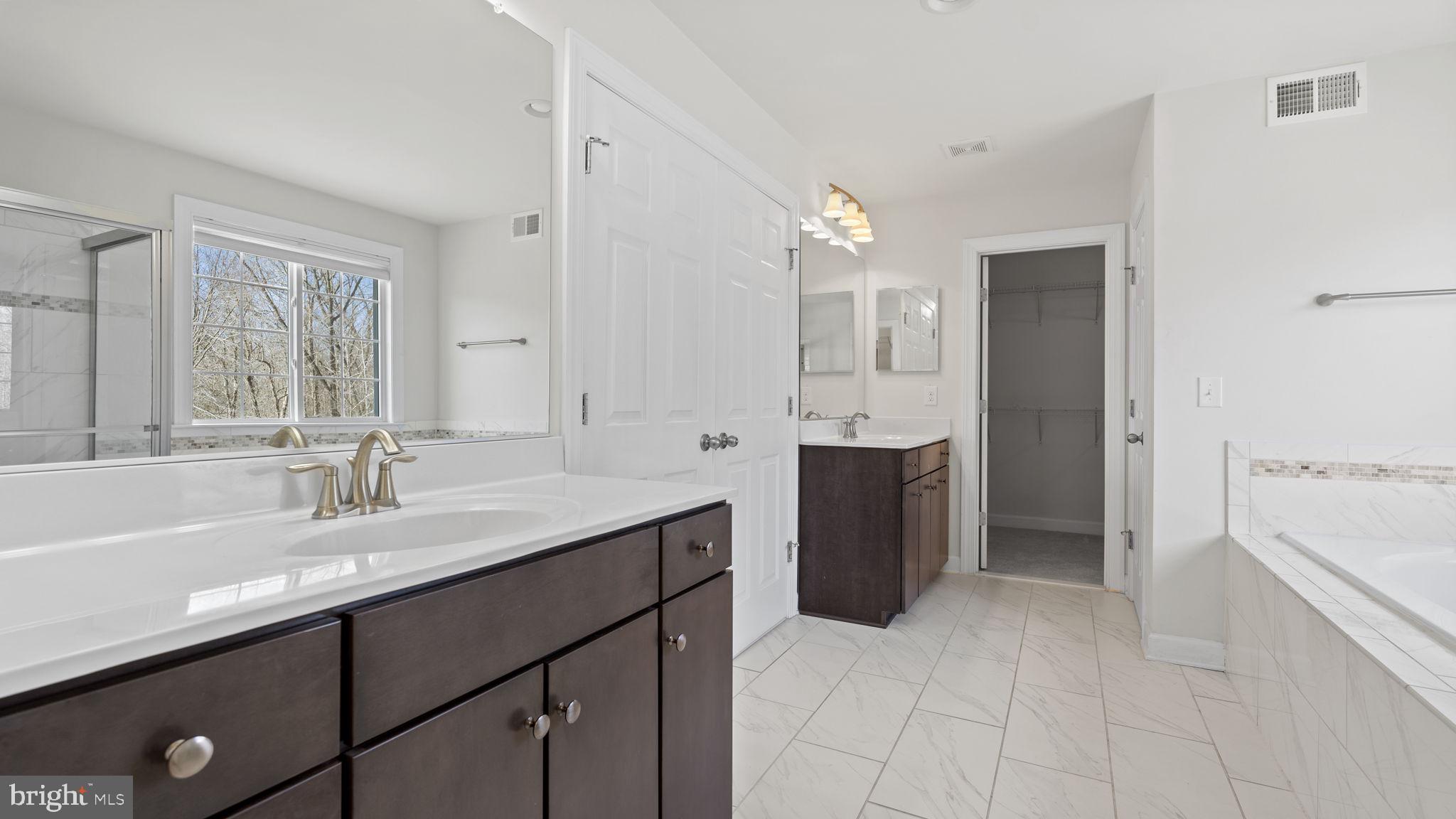250 Perth Drive Fredericksburg, VA 22405 - Photo 28 of 57 Separate vanities in the primary bathroom