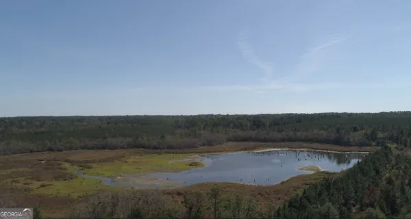 a view of lake and mountains