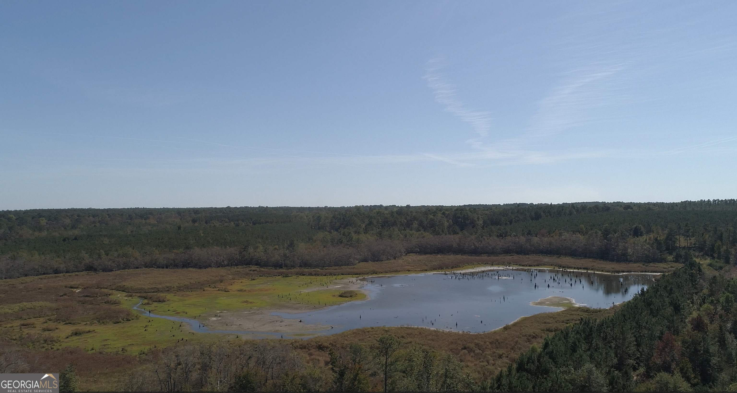 a view of lake and mountains