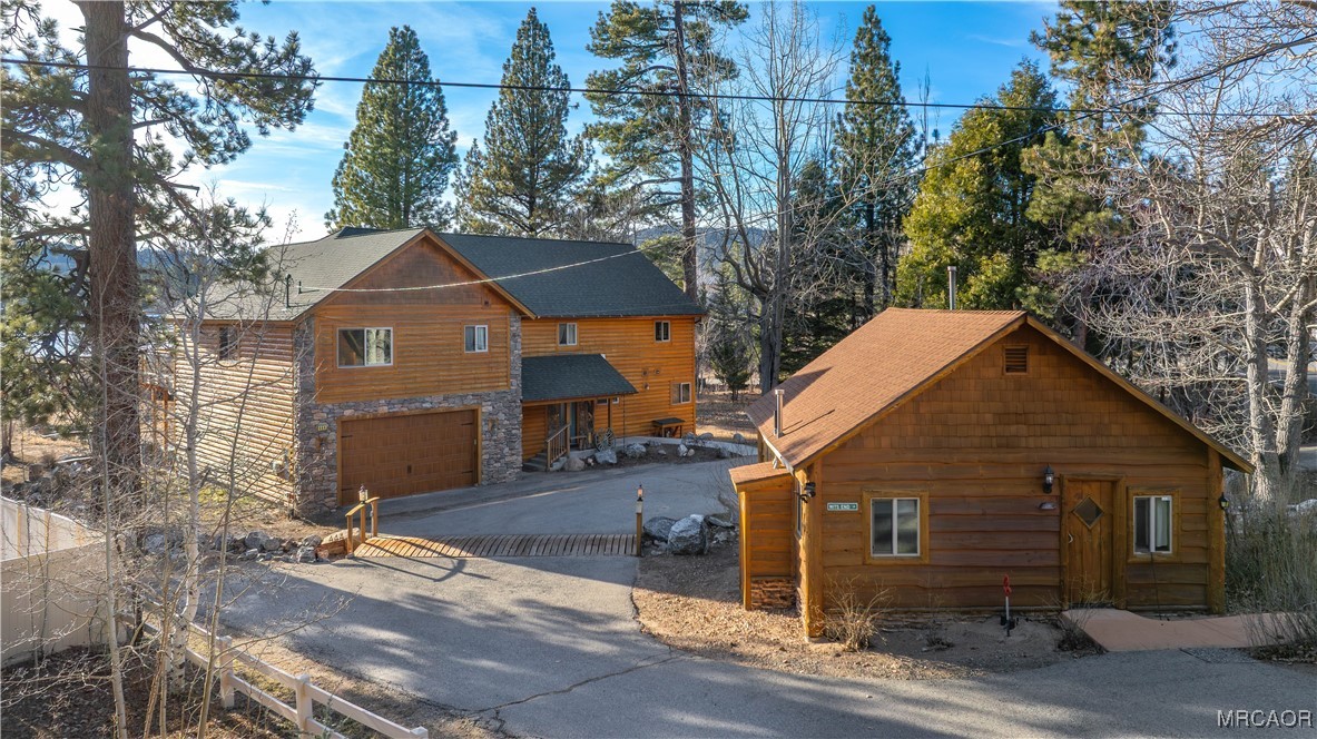 448 Edgemoor Road Big Bear Lake, CA 92315 - Photo 40 of 42 a front view of a house with a yard