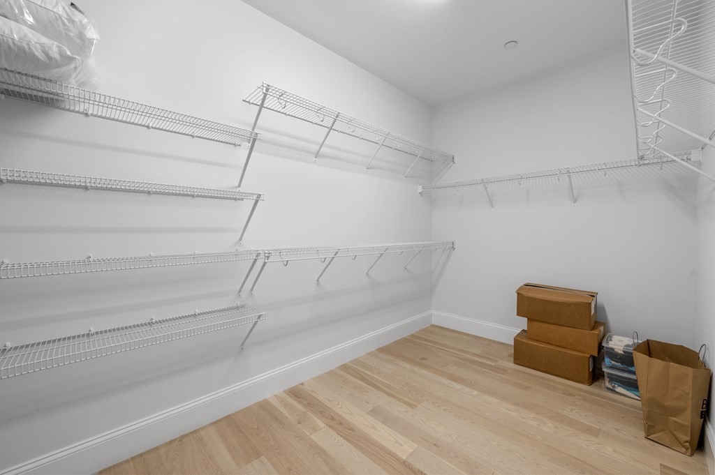 30 Pne Hl Road, Unit 30 Wenham, MA 01984 - Photo 23 of 32 a hallway with a couch