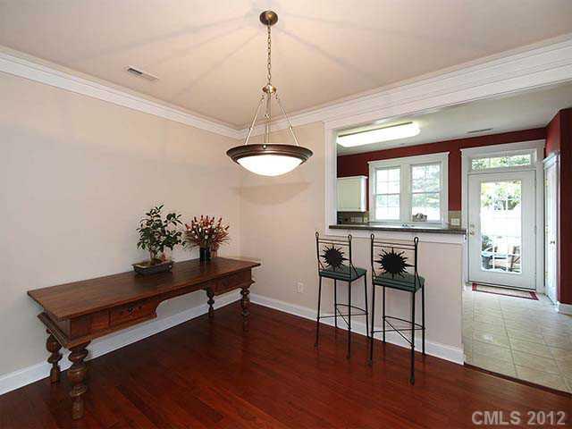 290 Elis Way, Unit 153 Fort Mill, SC 29708 - Photo 4 of 16 a living room with furniture and a wooden floor