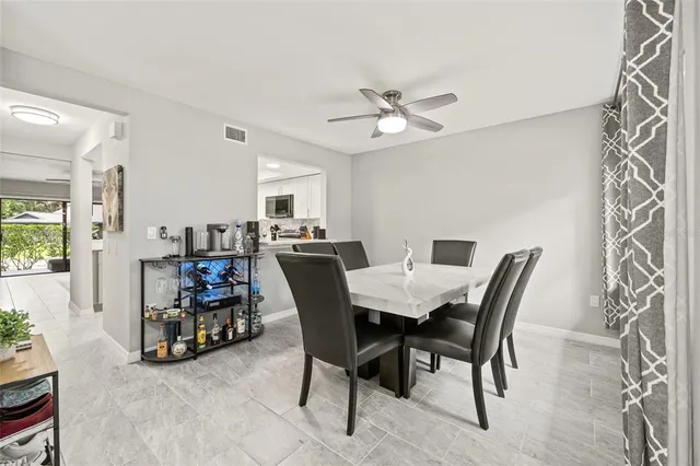 a view of a dining room with furniture