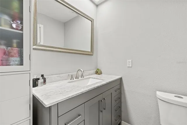 a bathroom with a sink and a toilet