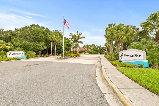 a view of a park with welcome board