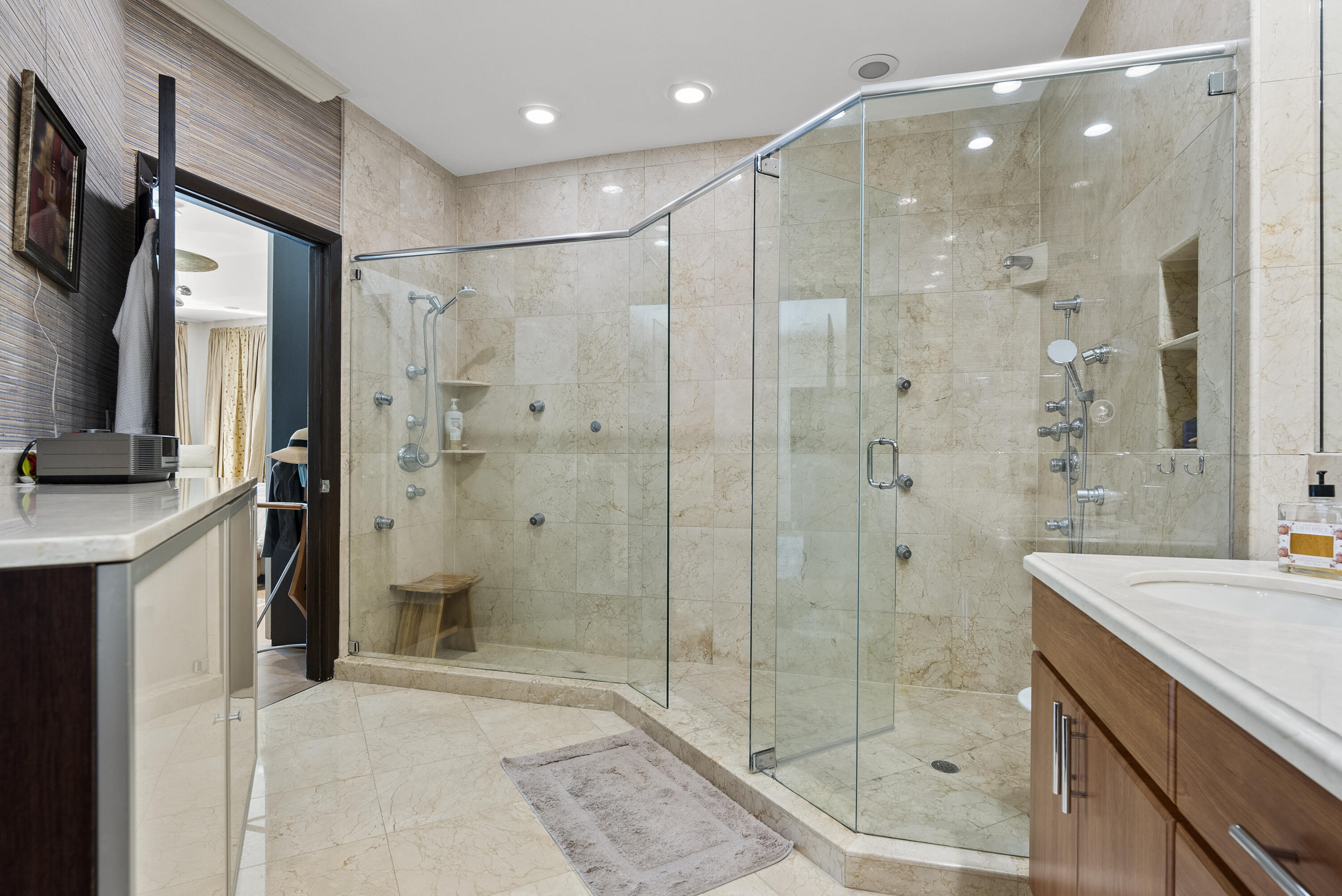 2245 Southwest 16th Place Boca Raton, FL 33486 - Photo 19 of 40 a bathroom with a shower sink and mirror