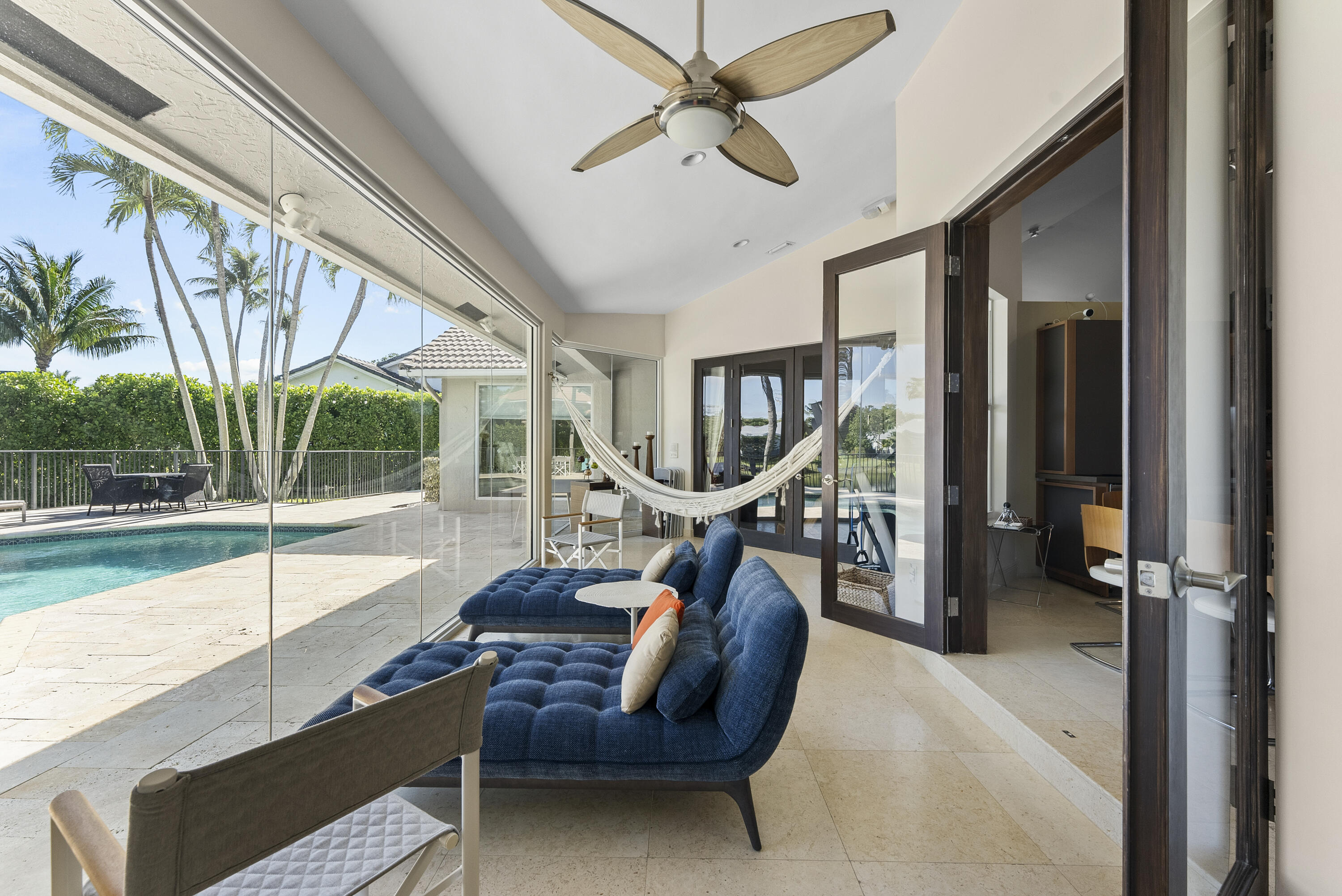 2245 Southwest 16th Place Boca Raton, FL 33486 - Photo 25 of 40 a view of a livingroom with furniture and a ceiling fan