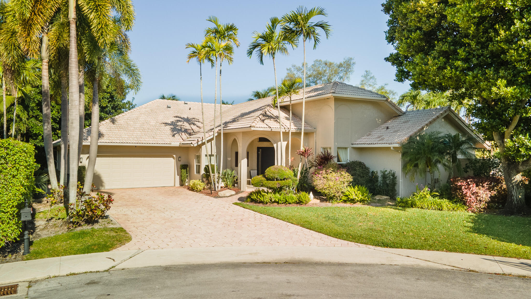 2245 Southwest 16th Place Boca Raton, FL 33486 - Photo 27 of 40 front view of a house with a yard