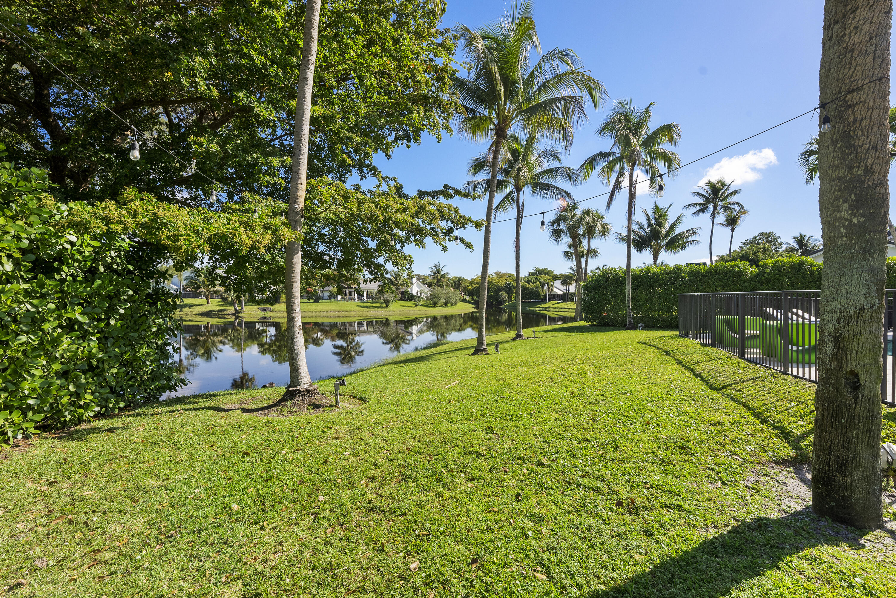 2245 Southwest 16th Place Boca Raton, FL 33486 - Photo 38 of 40 a view of a backyard with a garden