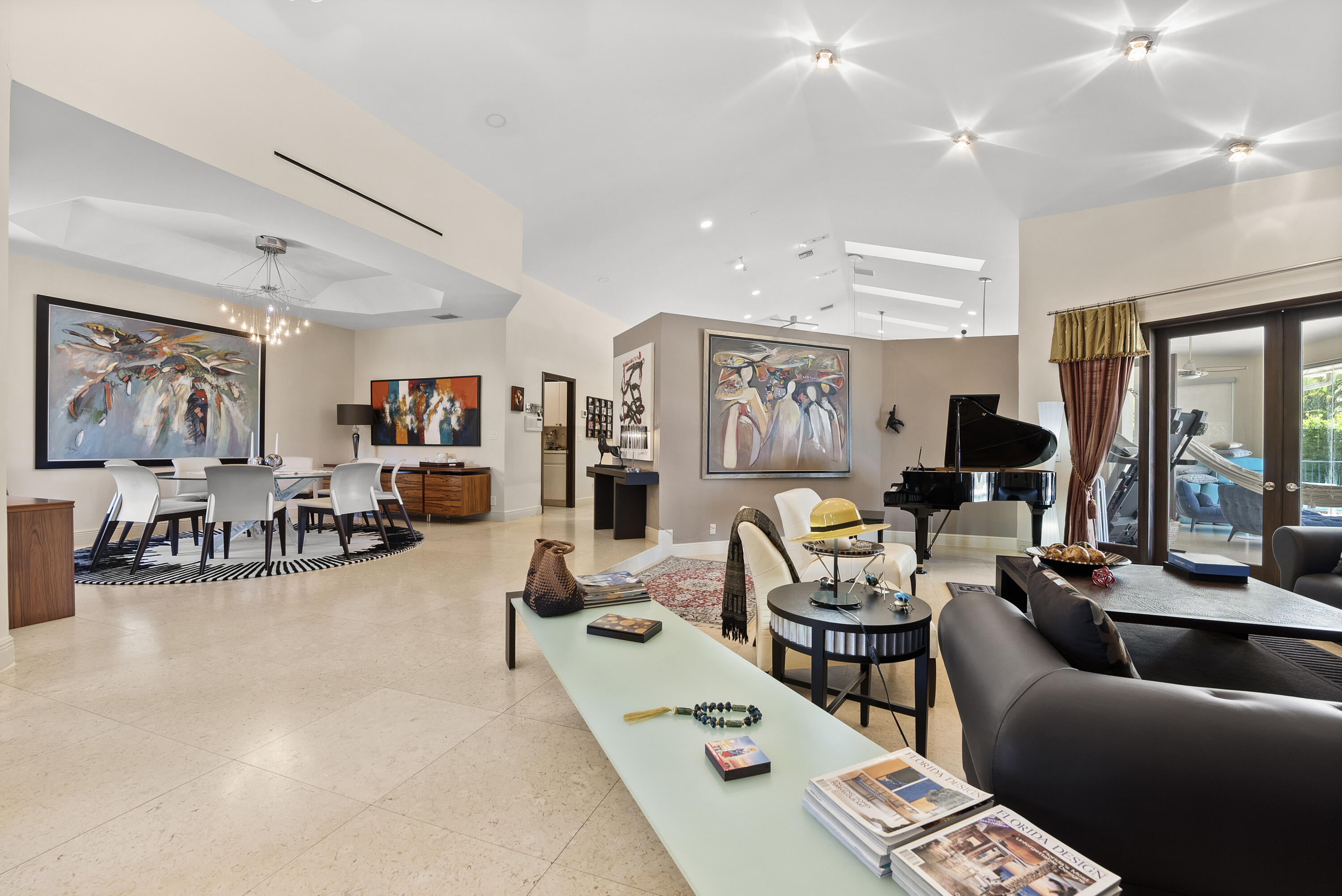 2245 Southwest 16th Place Boca Raton, FL 33486 - Photo 9 of 40 a living room with furniture and a flat screen tv