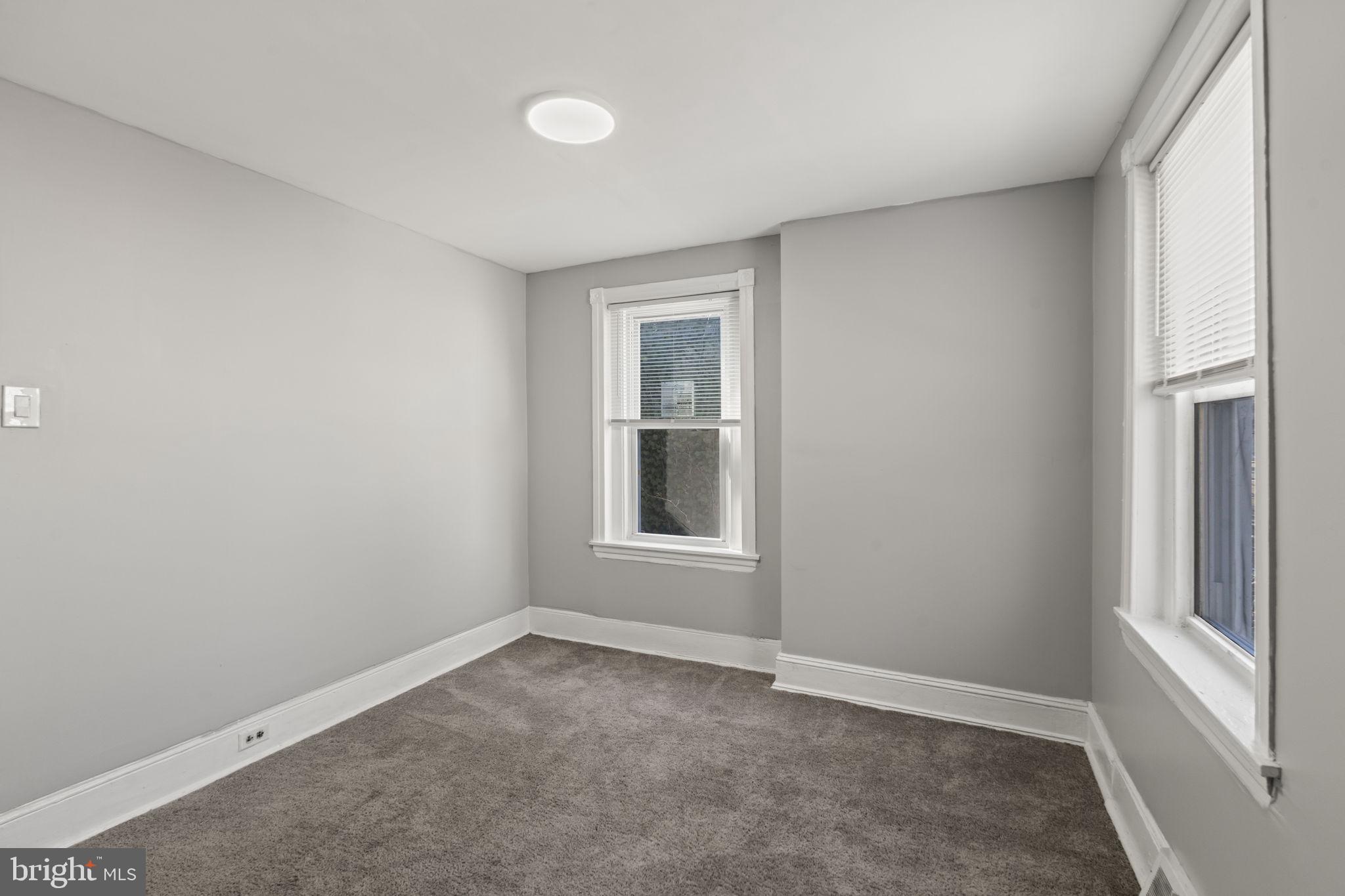 2314 West 3rd Street Chester, PA 19013 - Photo 20 of 32 an empty room with a window