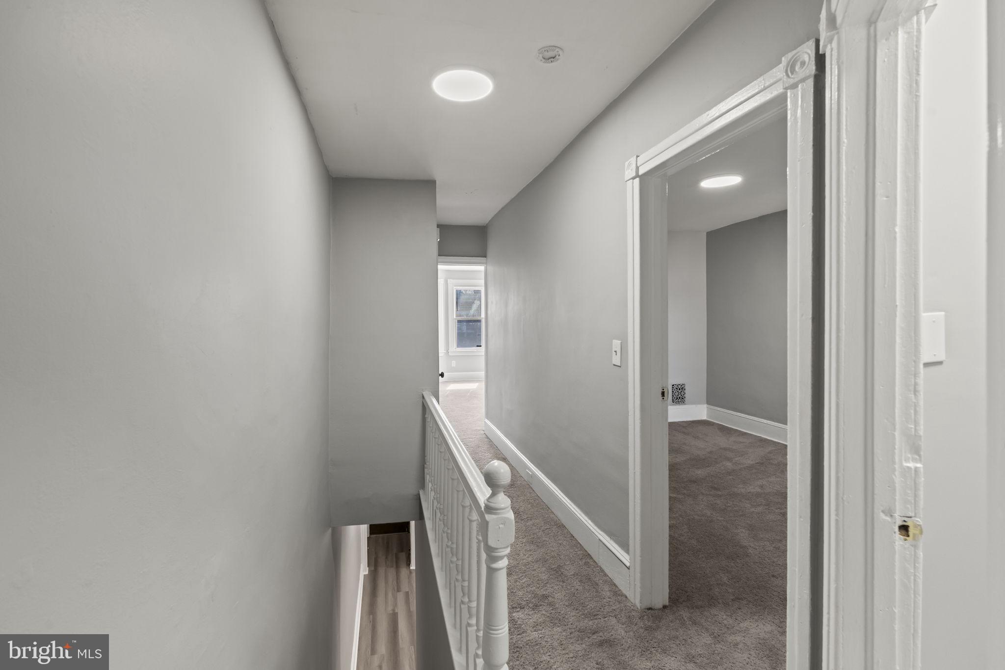 2314 West 3rd Street Chester, PA 19013 - Photo 21 of 32 a view of a hallway with staircase