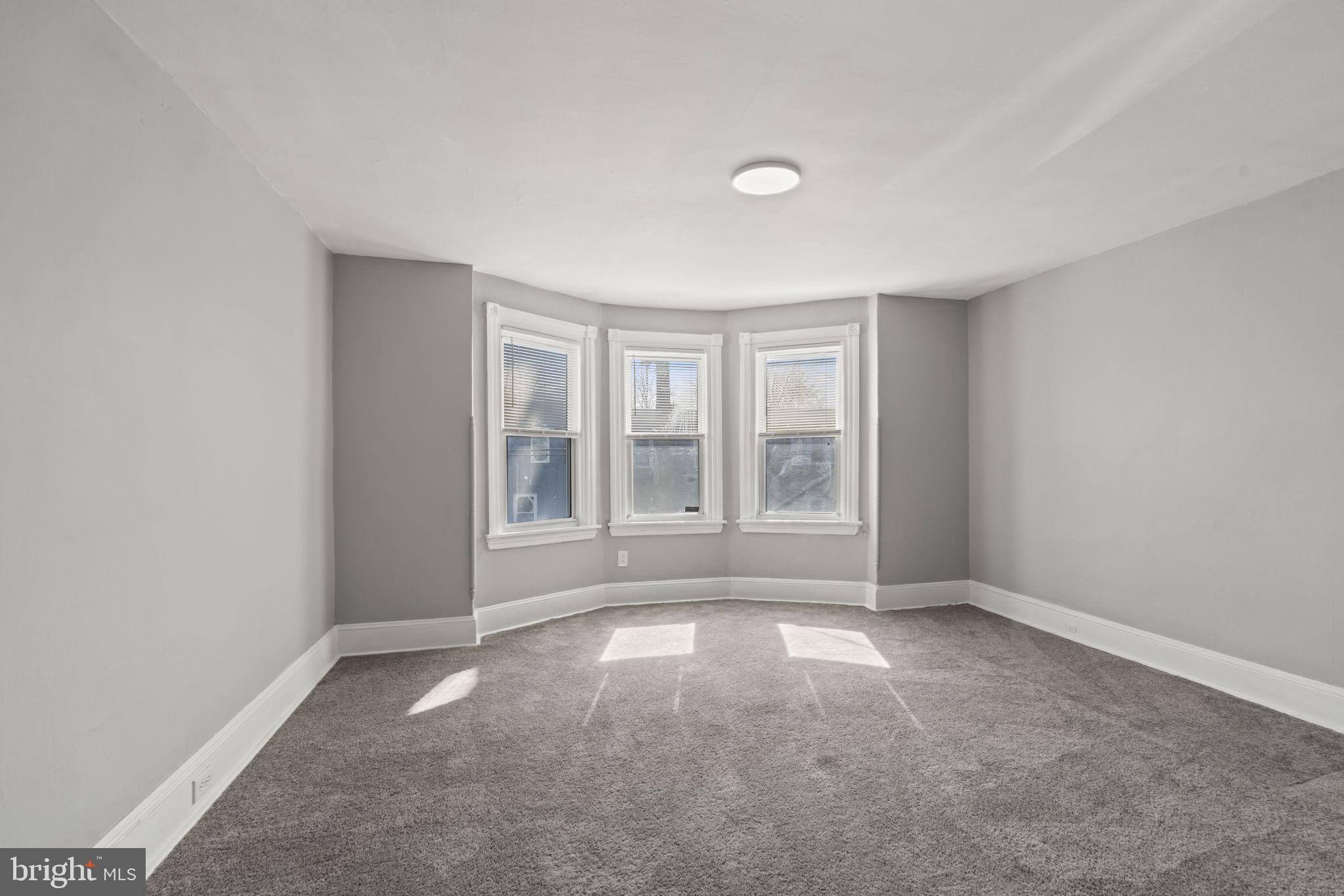 2314 West 3rd Street Chester, PA 19013 - Photo 28 of 32 a view of an empty room with a window