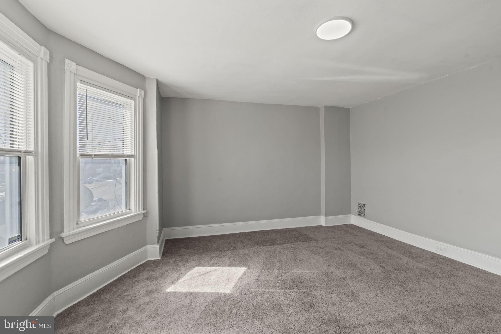 2314 West 3rd Street Chester, PA 19013 - Photo 29 of 32 an empty room with windows