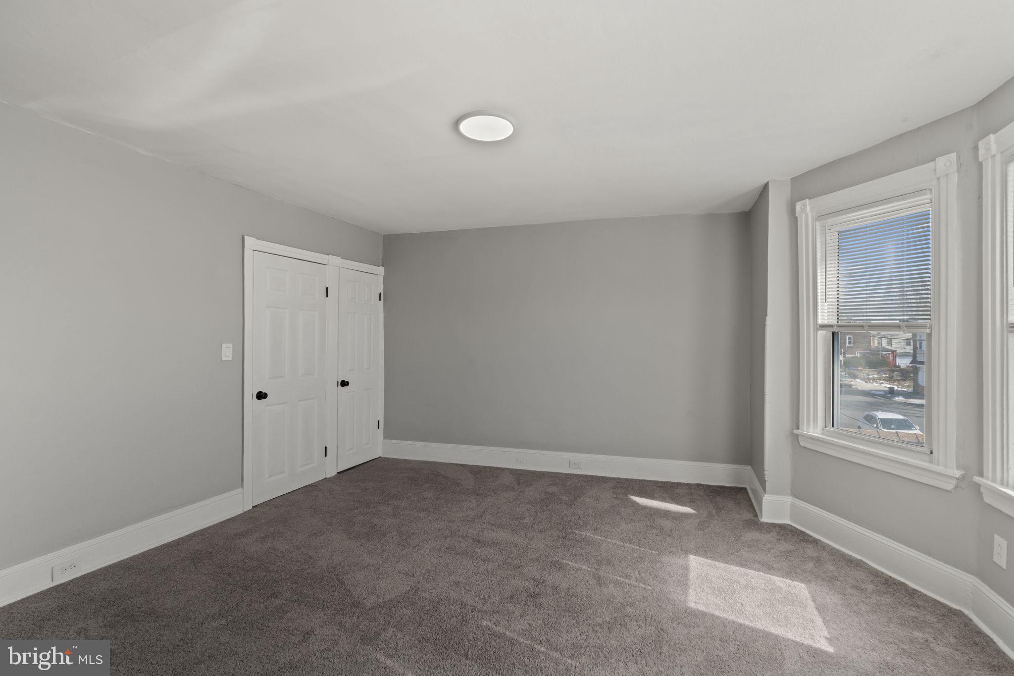 2314 West 3rd Street Chester, PA 19013 - Photo 30 of 32 a view of an empty room with a window