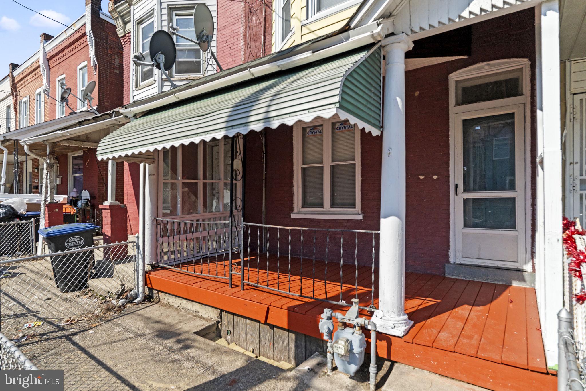2314 West 3rd Street Chester, PA 19013 - Photo 3 of 32 a view of a patio with a table and chairs