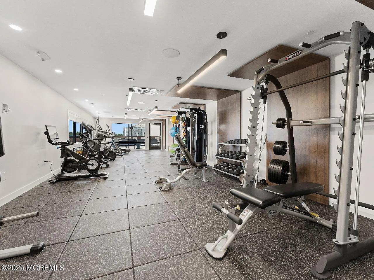 27 3rd Avenue, Unit 304 Long Branch, NJ 07740 - Photo 16 of 28 a view of a room with gym equipment