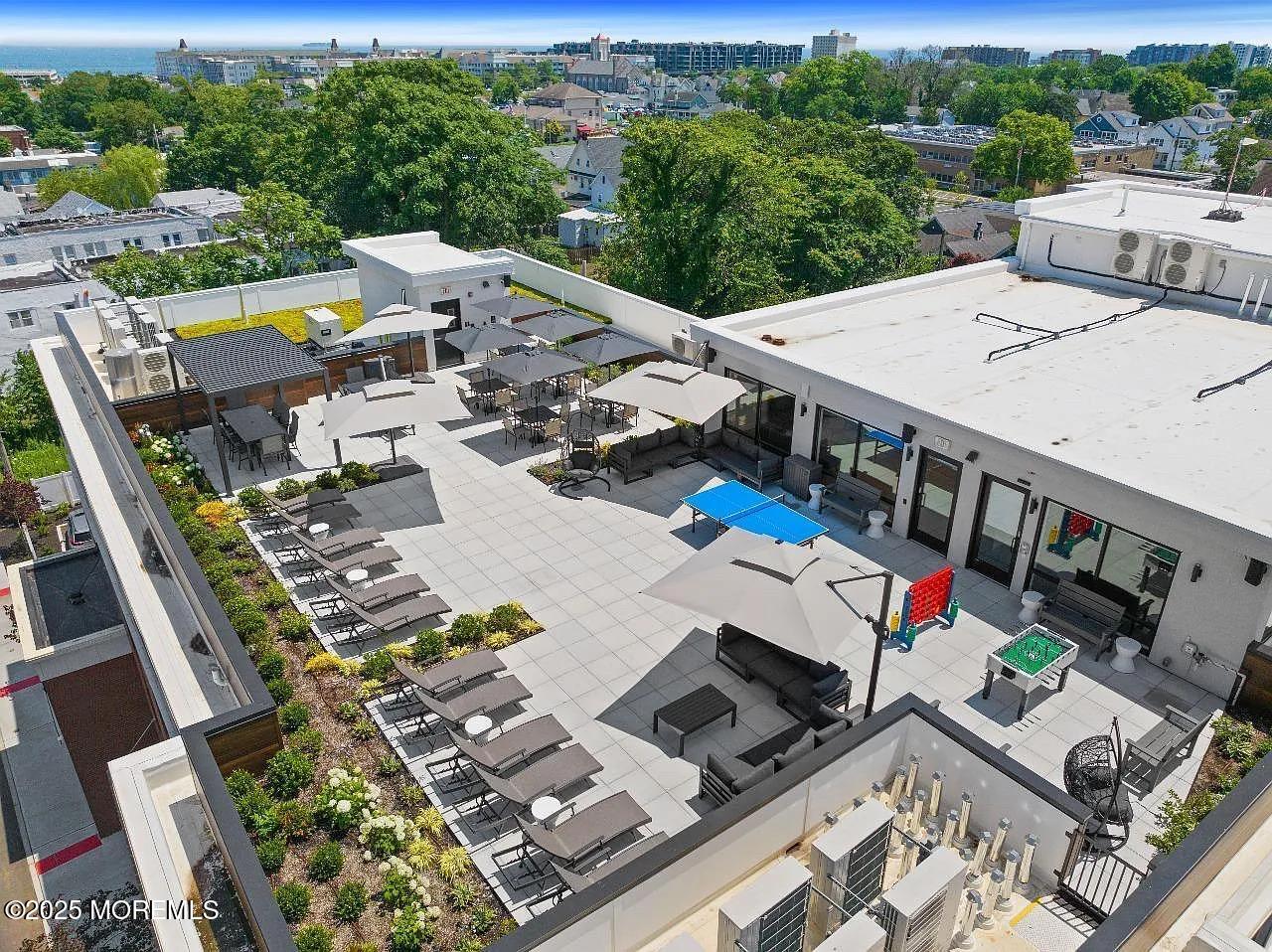 27 3rd Avenue, Unit 304 Long Branch, NJ 07740 - Photo 20 of 28 an aerial view of a house with outdoor space