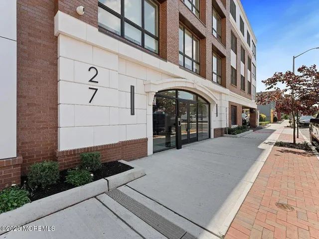 a view of a building with a street