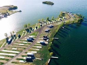 a view of a water yard and front of house
