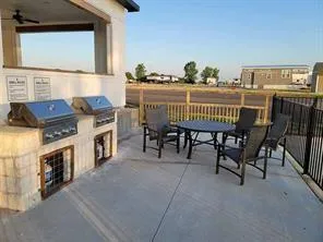 a dining room with furniture and a fireplace