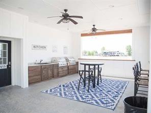 5084 Waterfront Road, Unit 6 Kerens, TX 75144 - Photo 6 of 9 a view of a dining room with furniture window and wooden floor