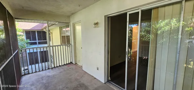 a view of a porch of a house