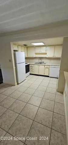 a utility room with cabinets
