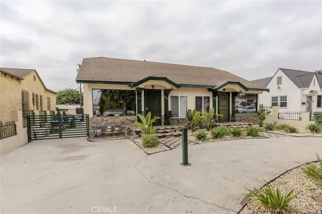 front view of a house with a patio