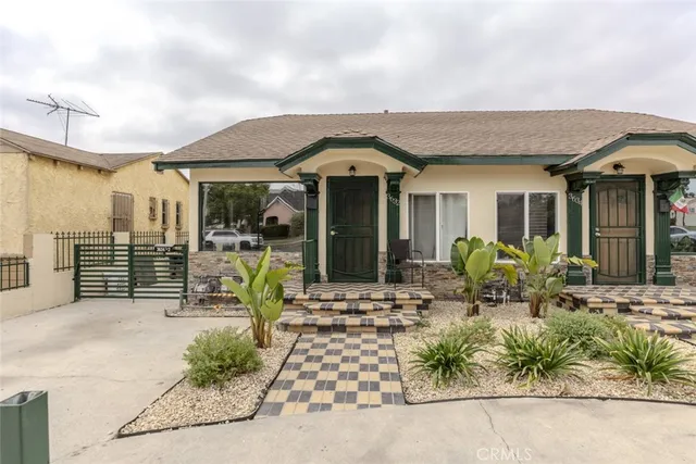 a view of a house with patio outdoor seating area