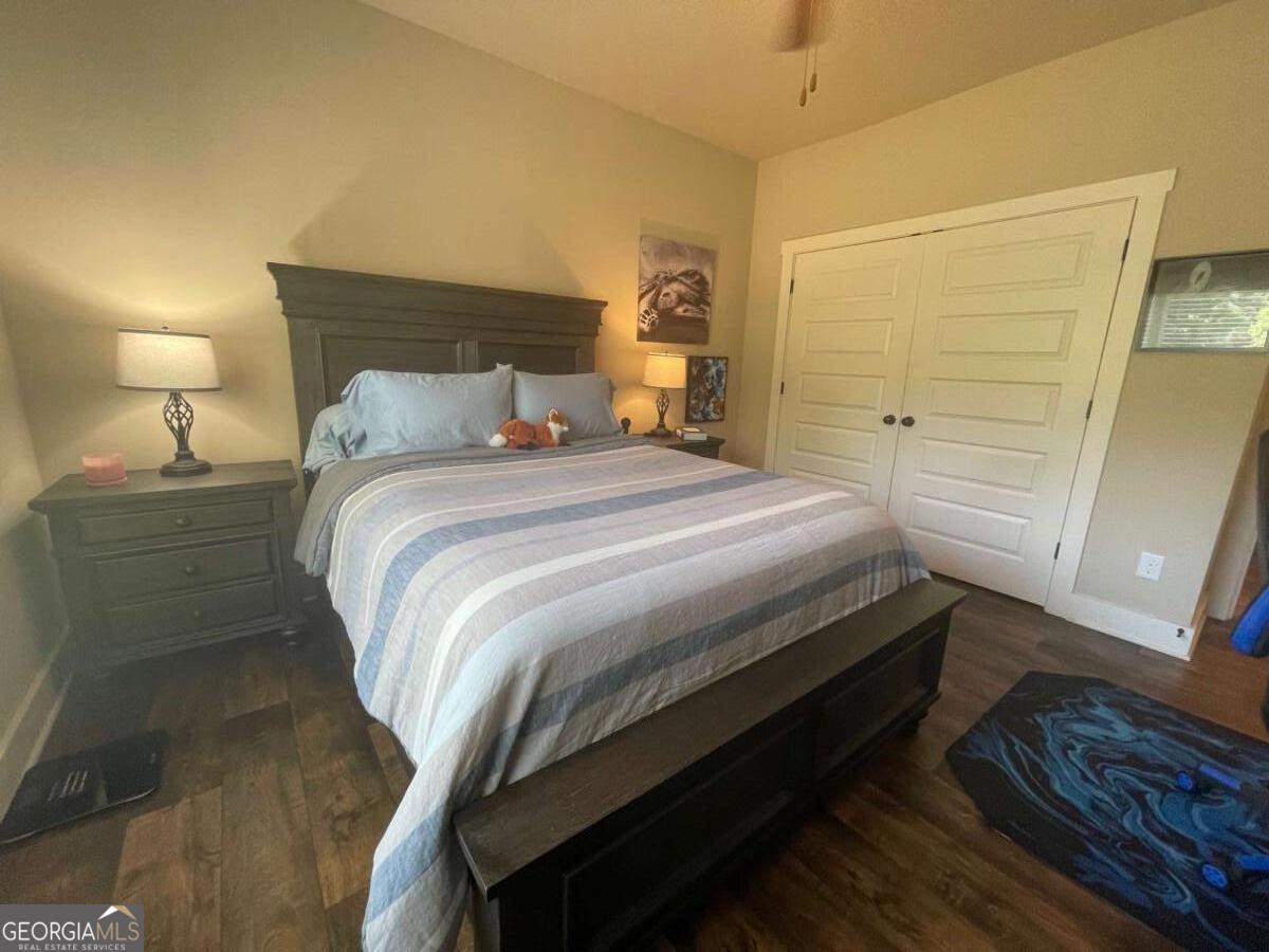 457 Old Good Hope Road Good Hope, GA 30641 - Photo 25 of 59 a bedroom with a bed and a mirror