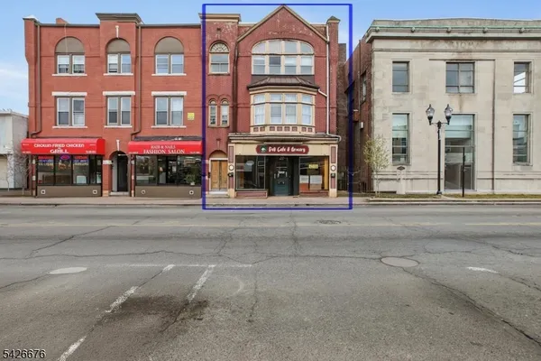 a front view of multi story residential apartment building