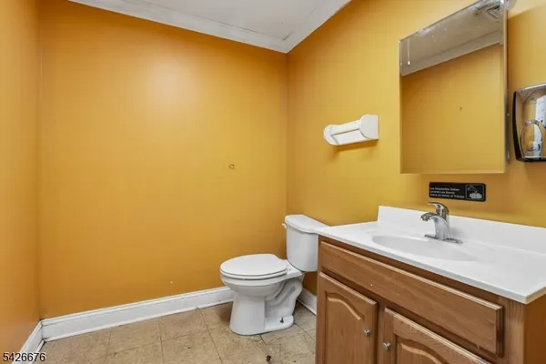 a bathroom with a sink and a toilet
