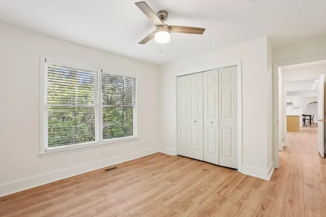 a view of a storage and utility room with washer and dryer