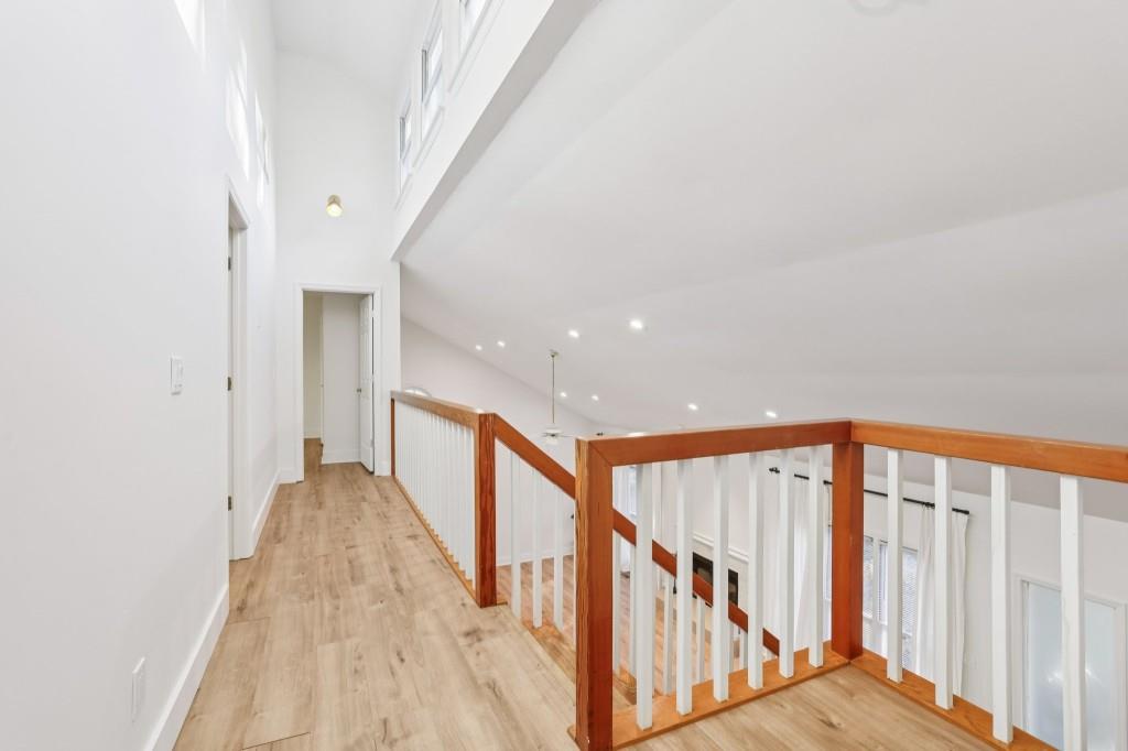 10630 Timberstone Road Alpharetta, GA 30022 - Photo 20 of 42 a view of staircase with railing and white walls