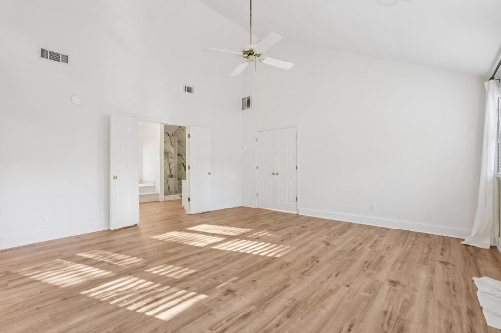 10630 Timberstone Road Alpharetta, GA 30022 - Photo 29 of 42 a view of empty room with wooden floor