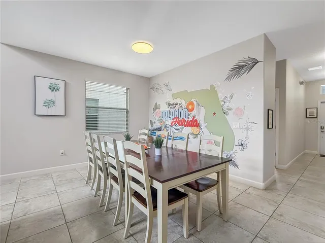 a view of a dining room with furniture