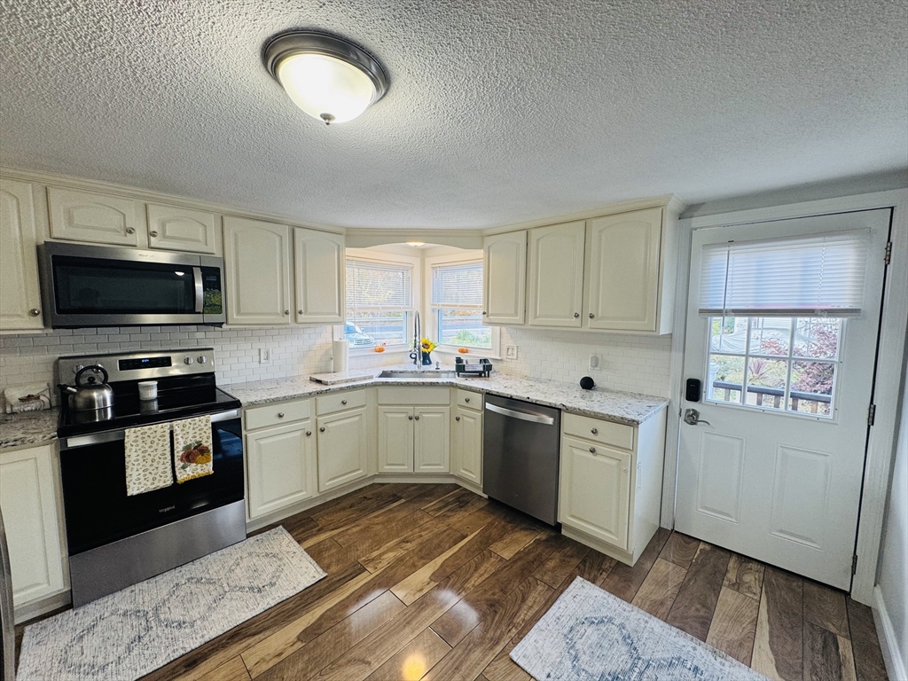 27 Fitchburg Street Marlborough, MA 01752 - Photo 15 of 37 a kitchen with a sink appliances and cabinets