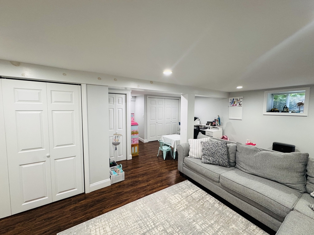 27 Fitchburg Street Marlborough, MA 01752 - Photo 19 of 37 a living room with furniture and a wooden floor