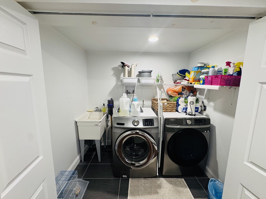27 Fitchburg Street Marlborough, MA 01752 - Photo 24 of 37 a utility room with sink dryer and washer