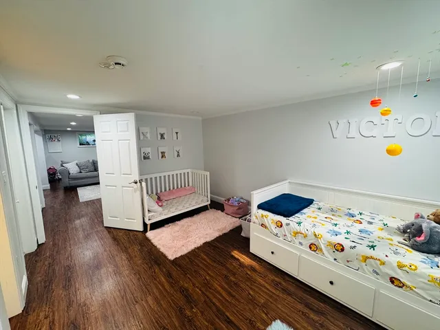 a bed room with a bed and a window