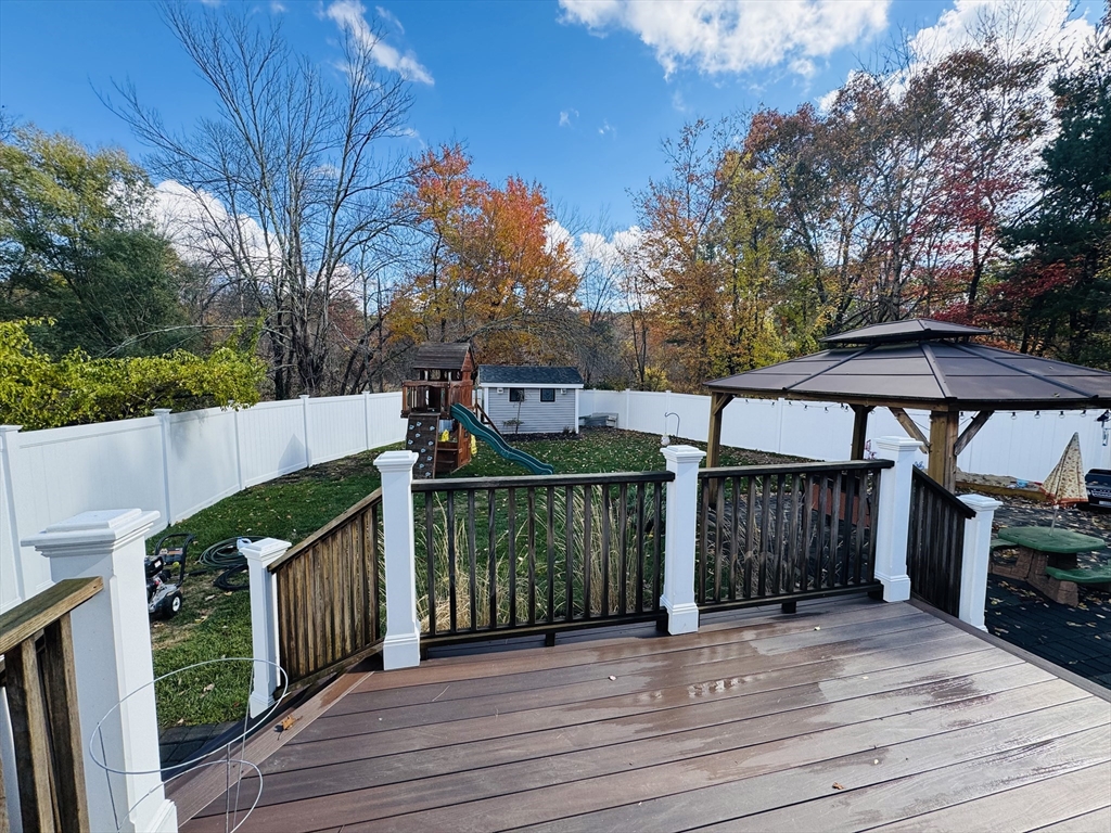 27 Fitchburg Street Marlborough, MA 01752 - Photo 30 of 37 a view of a house with wooden fence