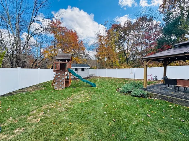 a childrens park with lots of swings and slides