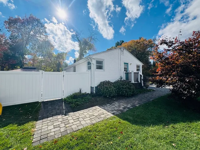a view of backyard with garden and plants